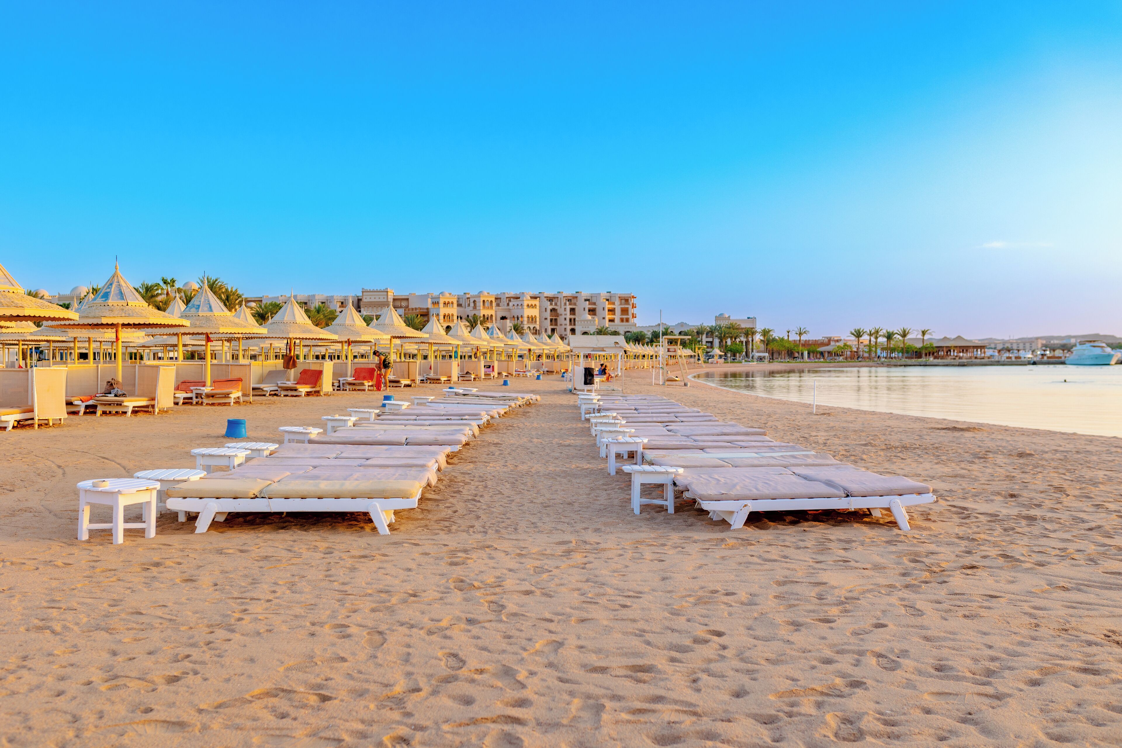 Private beach, beach umbrellas, beach towels, beach yoga