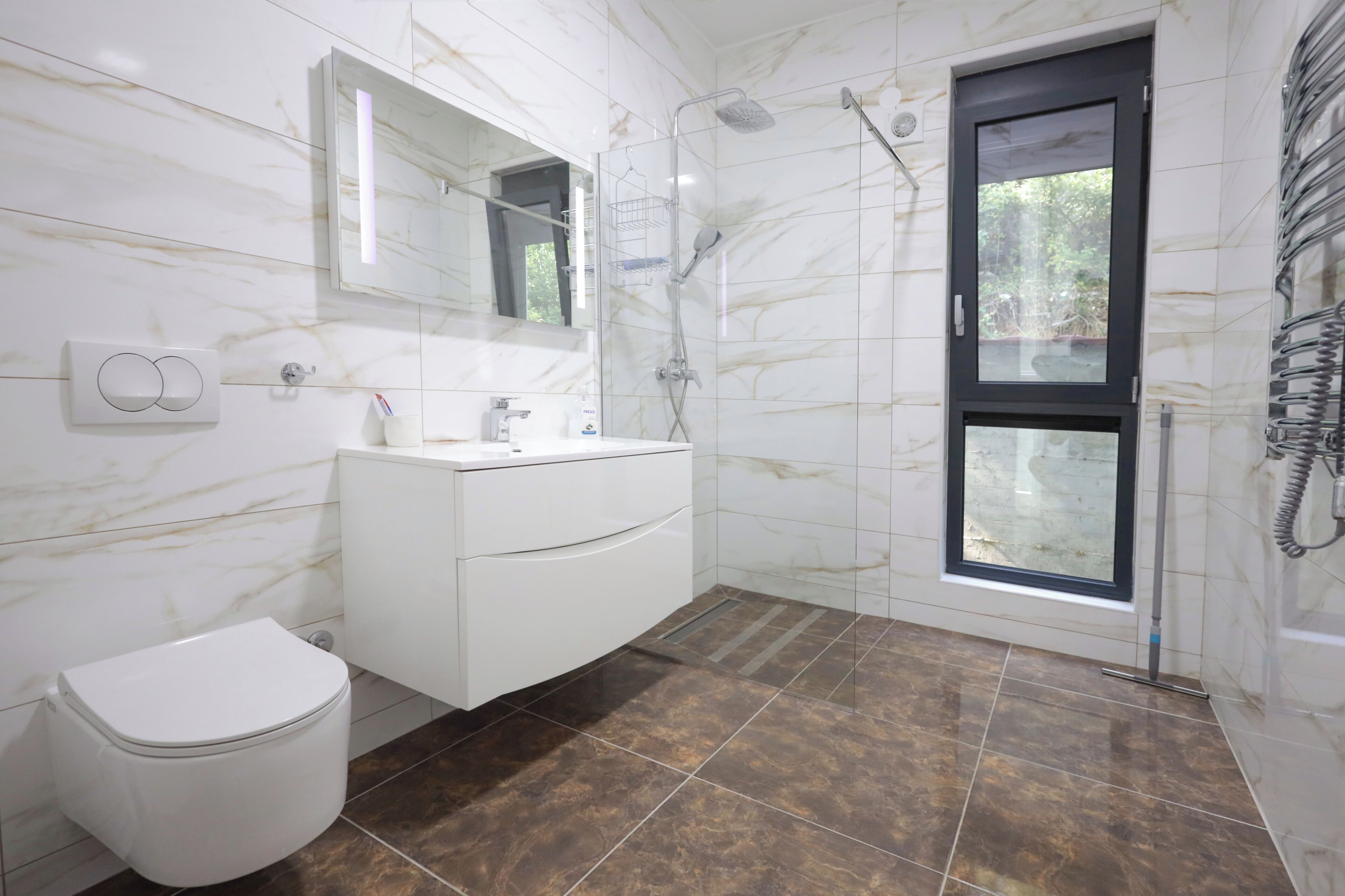 Shower, towels, soap, toilet paper