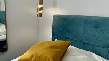 Coffres-forts dans les chambres, fer et planche Ă repasser