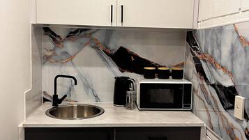 Fridge, microwave, electric kettle, toaster