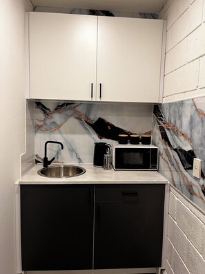 Fridge, microwave, electric kettle, toaster