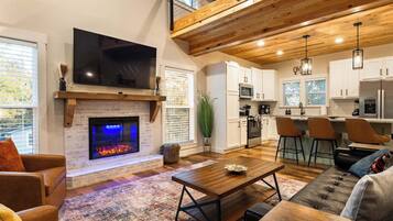 Télévision, cheminée, espaces bureaux