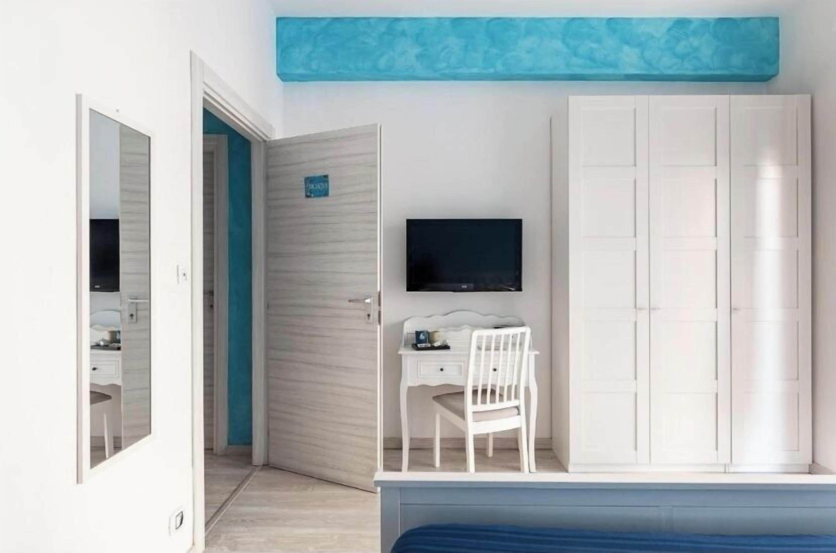 Deluxe Double Room, Balcony | Blackout drapes, iron/ironing board, free WiFi