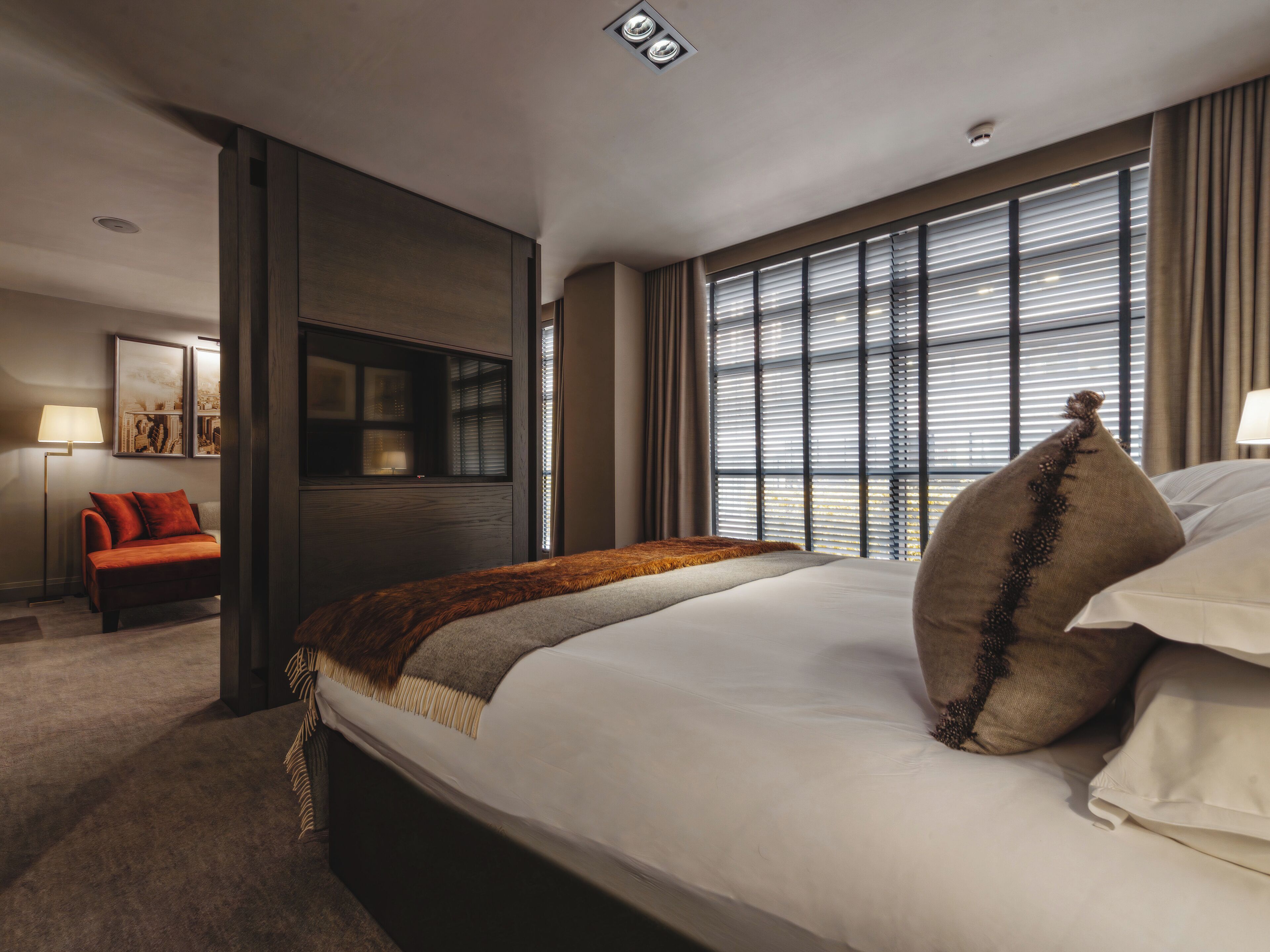 Signature Suite | In-room safe, desk, laptop workspace, iron/ironing board