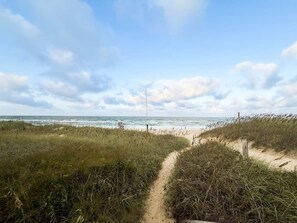 A beach path leading to the ocean with dunes on either side. - Brand new OCEANVIEW with POOL (Kill Devil Hills)