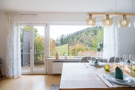 Dining. Holiday Home 'Sonnenterrasse 9' with Private Terrace, Balcony & Wi-Fi