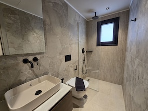 A modern bathroom with a bathtub, toilet, and shower. - Nysa Luxury villa 4, Private pool, Near Hersonissos (Heraklion)