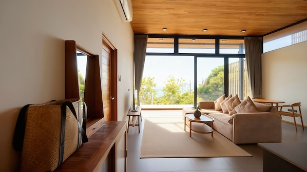 Vila romântica, 1 quarto, piscina particular, vista para o mar | Área de estar
