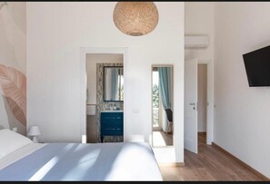 Deluxe Double Room, Balcony, City View | In-room safe, soundproofing, iron/ironing board, free WiFi