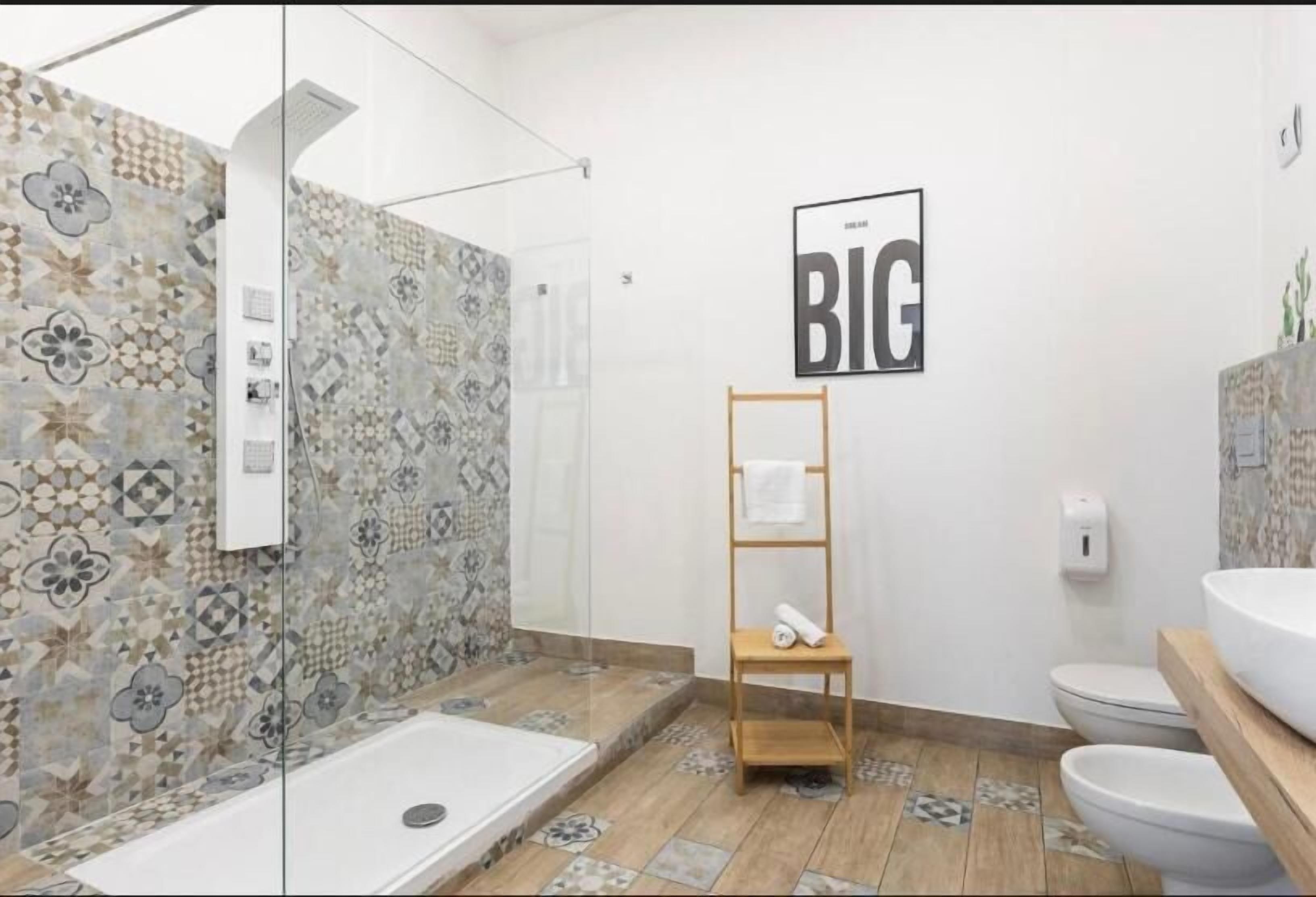 Luxury Quadruple Room, Balcony | Bathroom | Shower, hair dryer, towels, soap