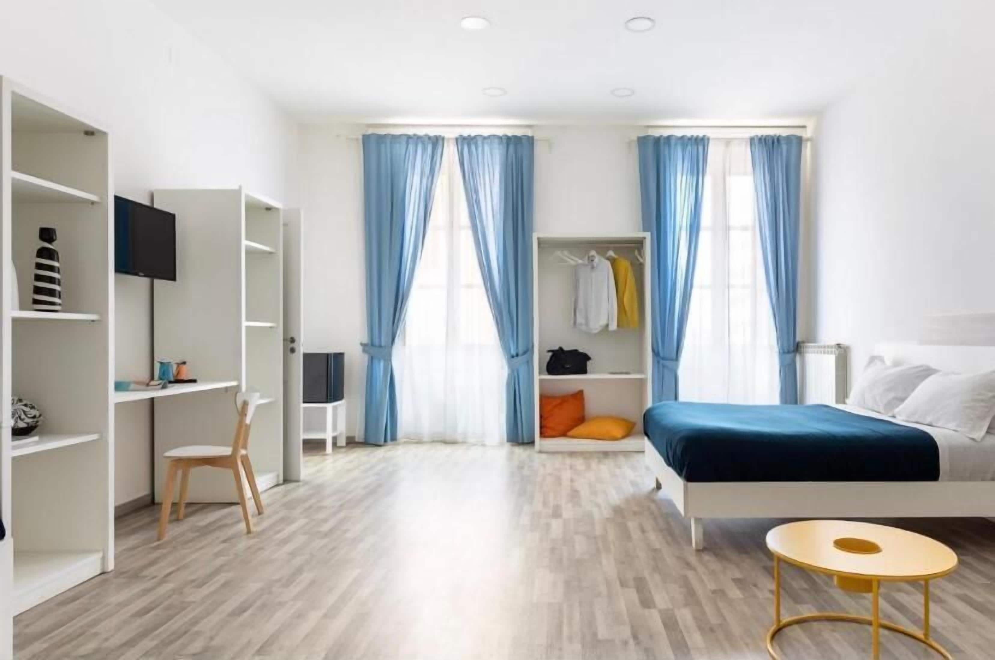 Family Quadruple Room | In-room safe, desk, soundproofing, iron/ironing board