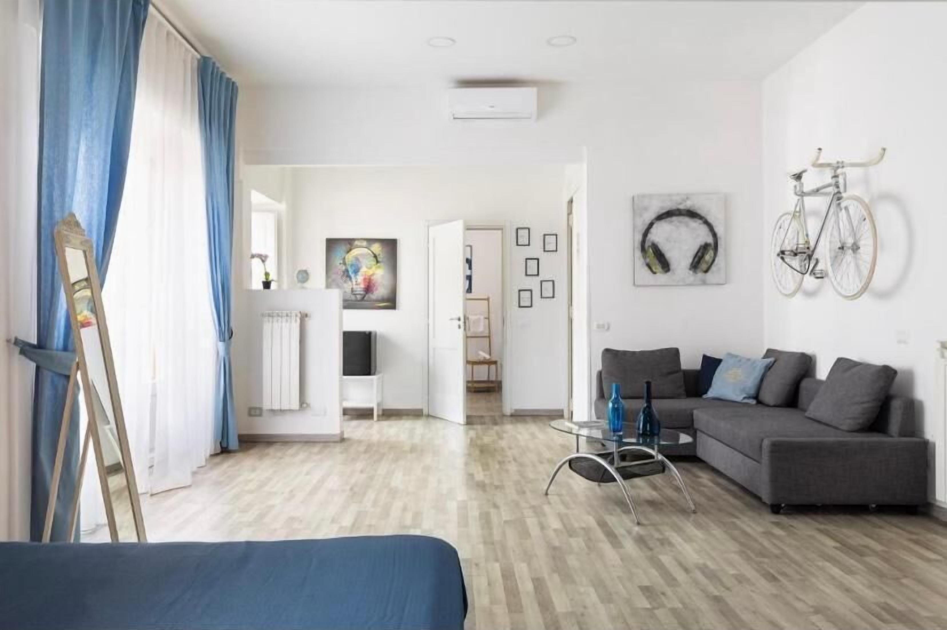 Luxury Quadruple Room, Balcony | In-room safe, desk, soundproofing, iron/ironing board