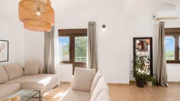 Villa (Five Bedroom Villa With Pool) | Living room | 32-inch flat-screen TV with digital channels