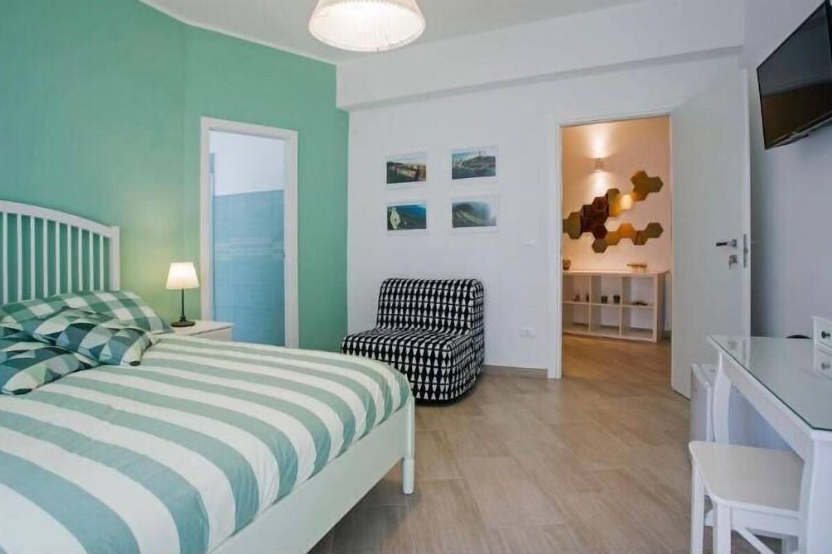 Deluxe Double Room, Balcony, Courtyard View | In-room safe, soundproofing, iron/ironing board, free WiFi