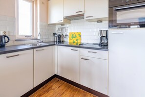 Apartment | Private kitchen - 2 Person Apartment With sea View and Sauna (De Koog)
