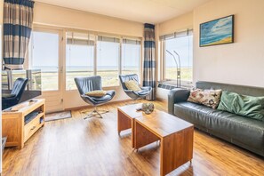Apartment | Living room - 2 Person Apartment With sea View and Sauna (De Koog)