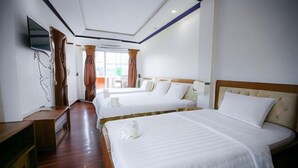A hotel room with two beds, a TV, and a wooden floor. - Vientiane Ruby Riverside Hotel & Hostel (Vientiane)