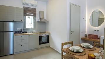 Deluxe Suite, Balcony, Ocean View | Desk, blackout drapes, soundproofing, iron/ironing board