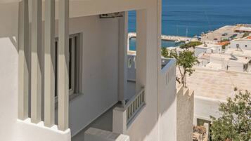 Family Apartment | Desk, blackout drapes, soundproofing, iron/ironing board