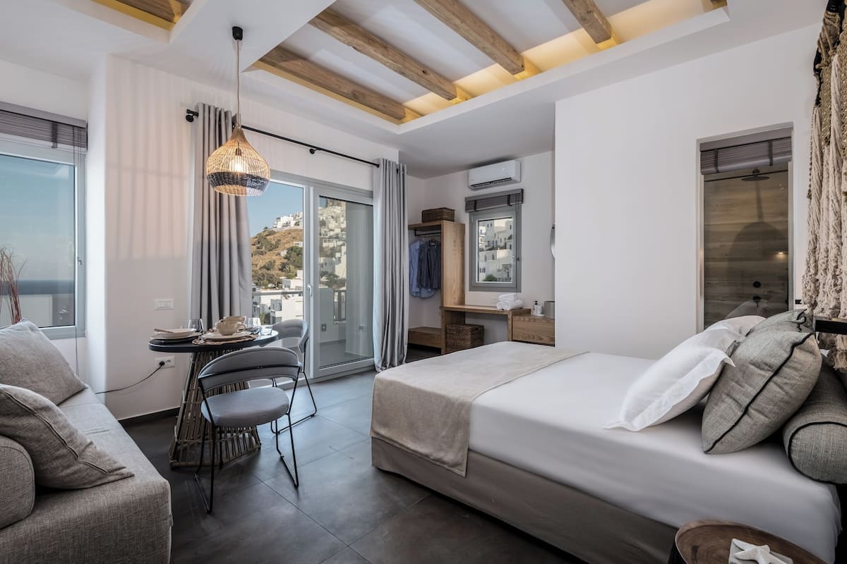 Superior Suite, Balcony, Ocean View | Desk, blackout curtains, soundproofing, iron/ironing board