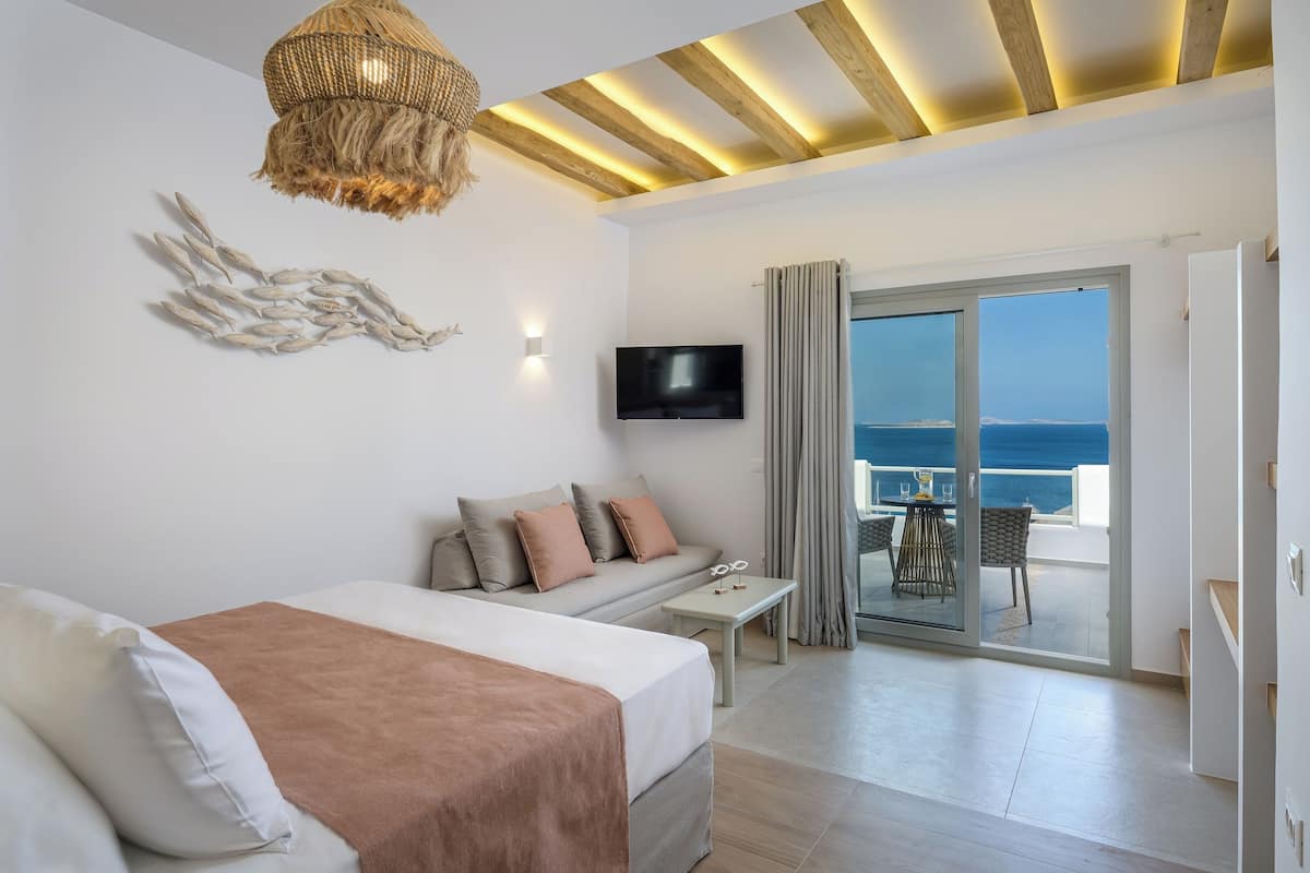 Deluxe Room, Balcony, Sea View | Desk, blackout drapes, soundproofing, iron/ironing board