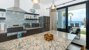 Condo, 1 Bedroom | Private kitchen | Fridge, oven, coffee/tea maker, toaster