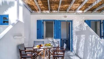 Family Apartment, Partial Sea View | Hypo-allergenic bedding, pillow-top beds, in-room safe