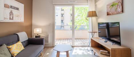 2 Bedroom Apartment | Living area | 42-inch flat-screen TV with digital channels