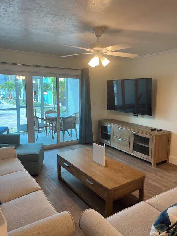 Signature Condo, 2 Bedrooms, Balcony, Beachside | Living room | 32-inch Smart TV with digital channels