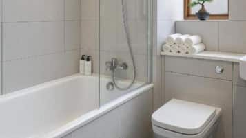 Hair dryer, towels, soap, shampoo