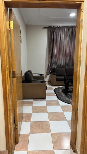 Basic Apartment | Living area | 32-inch LCD TV with satellite channels - Alora Zone (Abha)