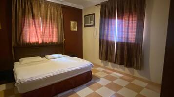 Family Apartment, City View | Premium bedding, pillowtop beds, free WiFi, bed sheets