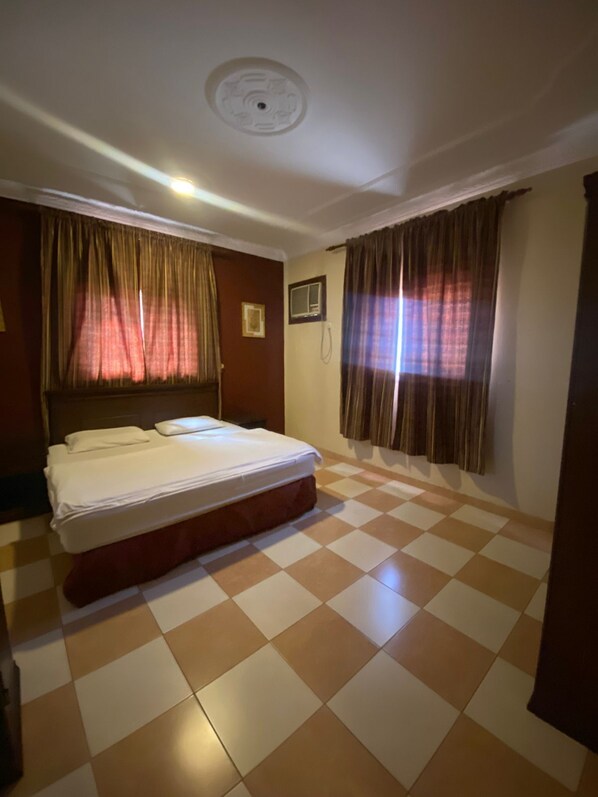 Familie appartement, uitzicht op de stad | Luxe beddengoed, pillowtop-bedden, gratis wifi, beddengoed