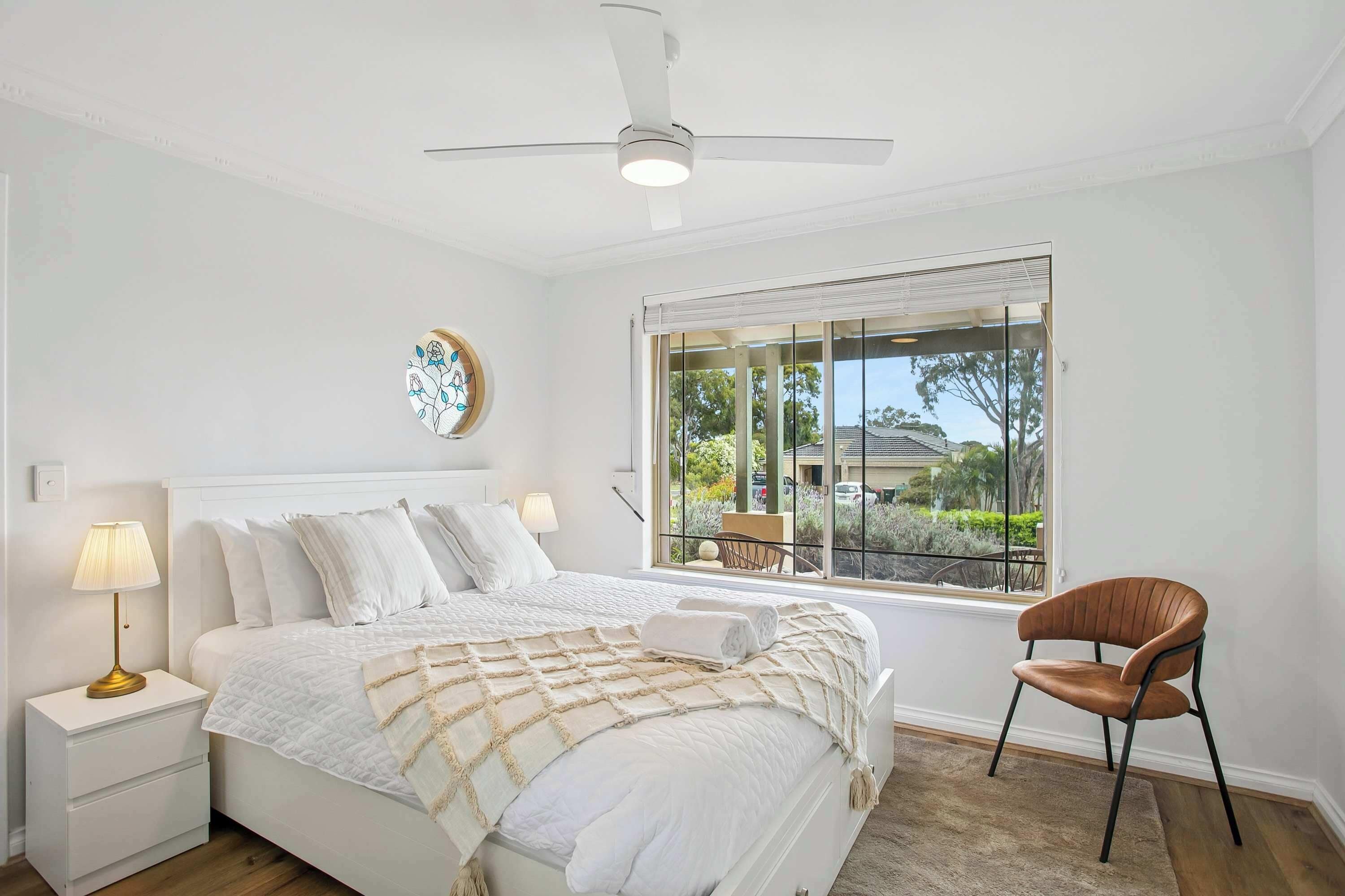 Bright and airy room designed for comfort and relaxation.