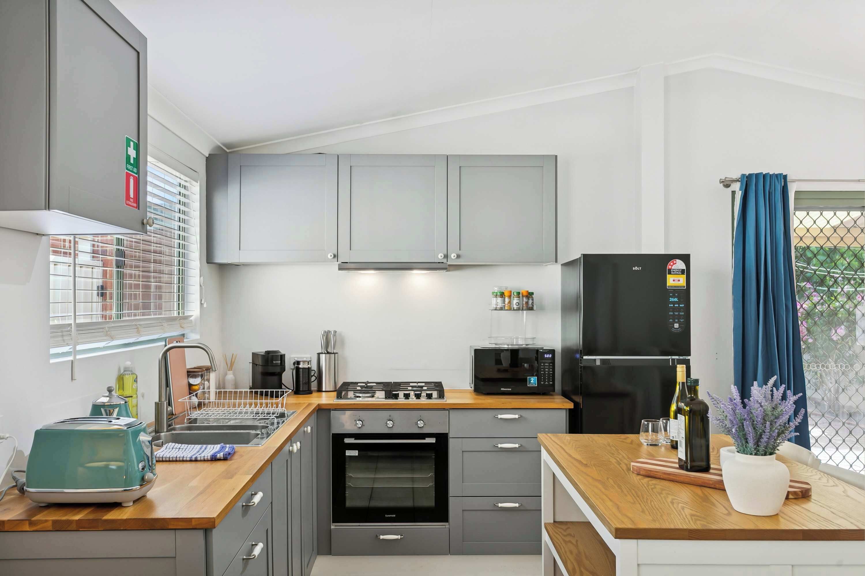 Coffee/tea maker, fridge, microwave, oven