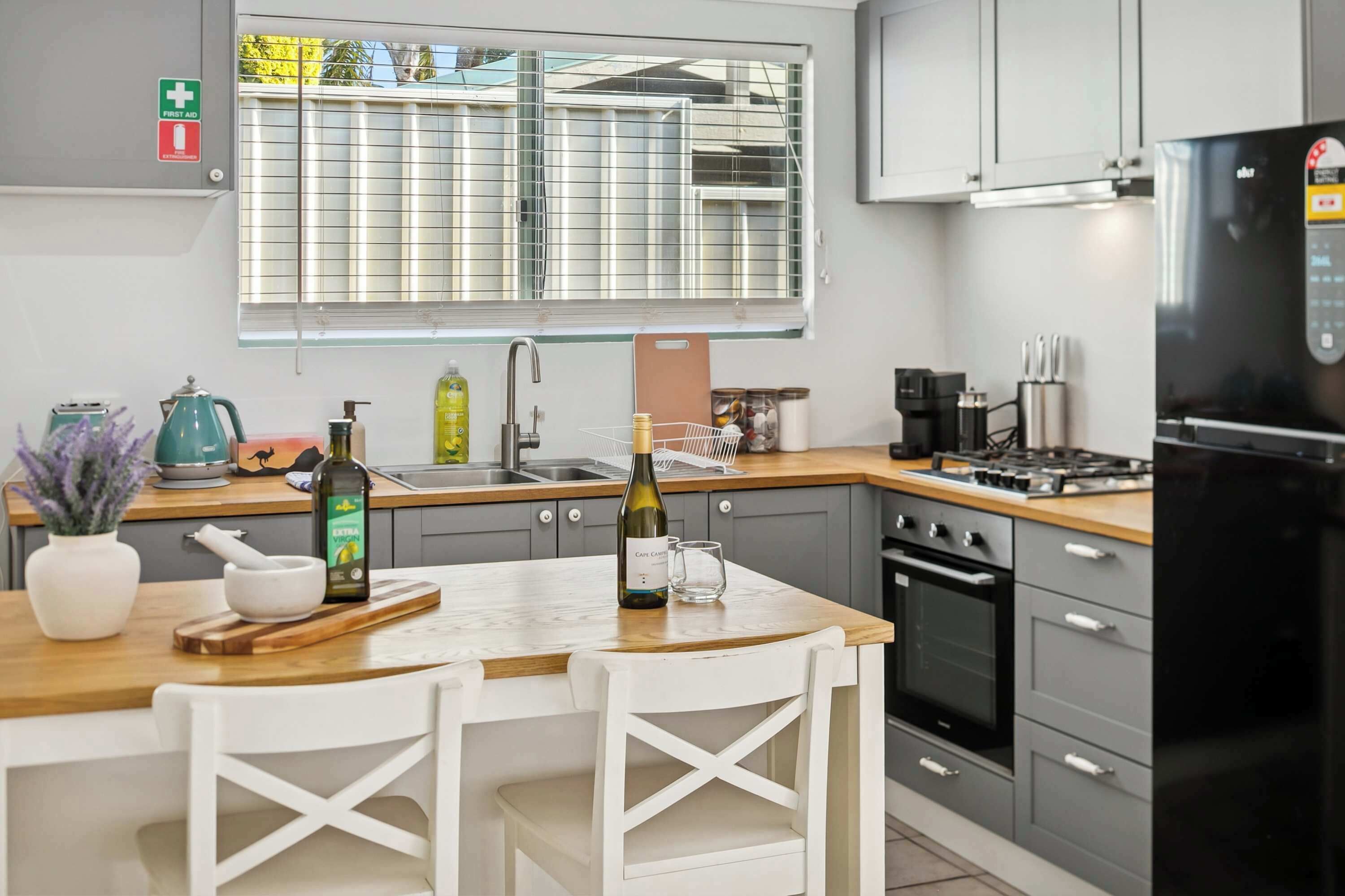 Coffee/tea maker, fridge, microwave, oven