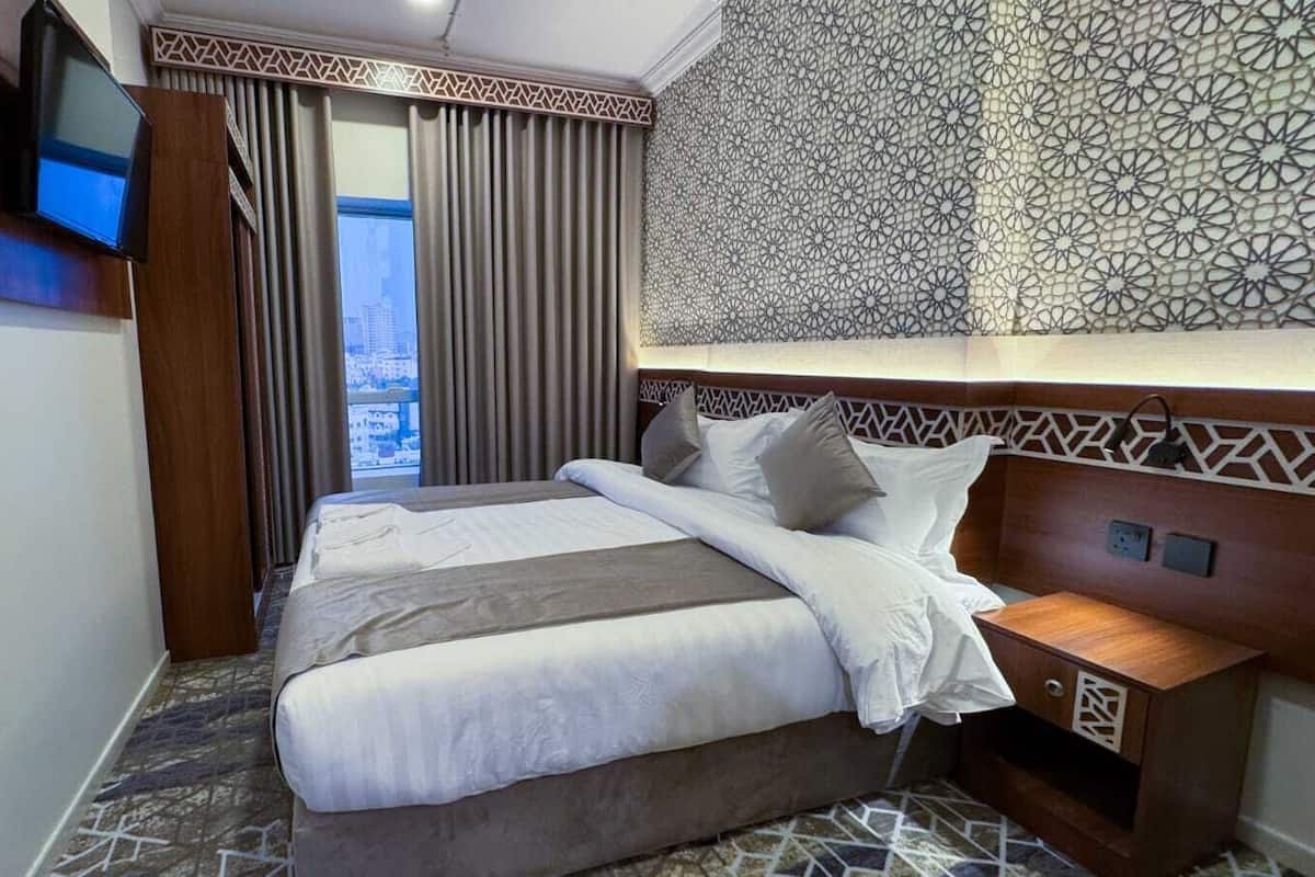 Two-bedroom family suite for 6 guests | Bộ trải giường 