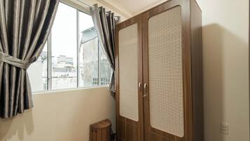 Quarto quádruplo luxo, vista para a cidade | Vista da propriedade