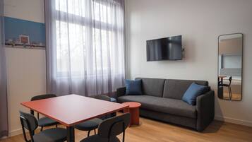 Family Studio | Bathroom | Shower, hair dryer, towels, soap