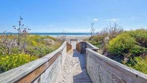 A wooden boardwalk leading to a beach with clear skies and ocean views. - No Agenda Hacienda QUARTER MILE WALK TO BEACH (Port Aransas)
