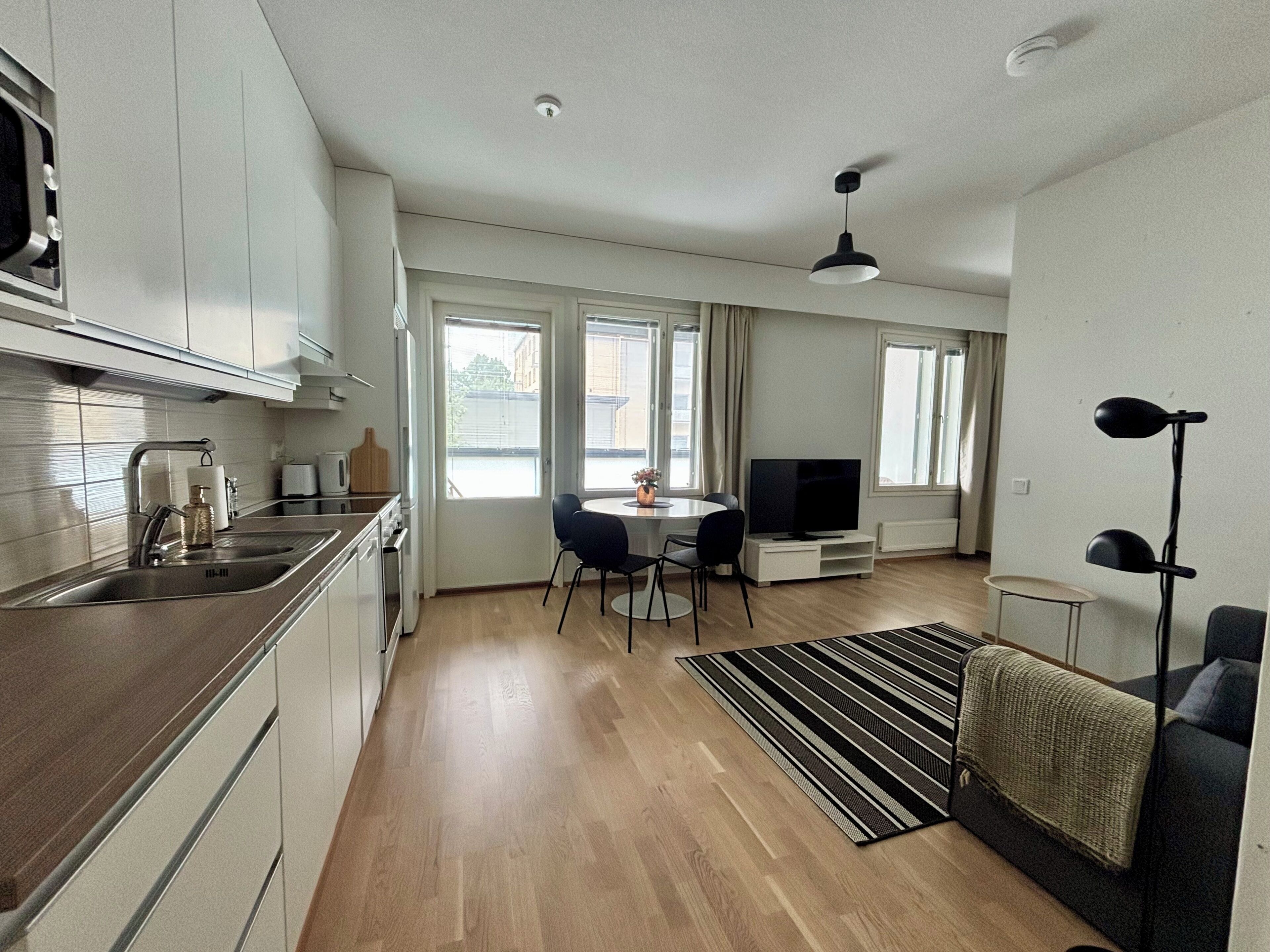 Studio Confort, balcon, vue cour intérieure | Coin séjour