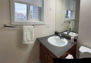 Shower, jetted tub, hair dryer, towels