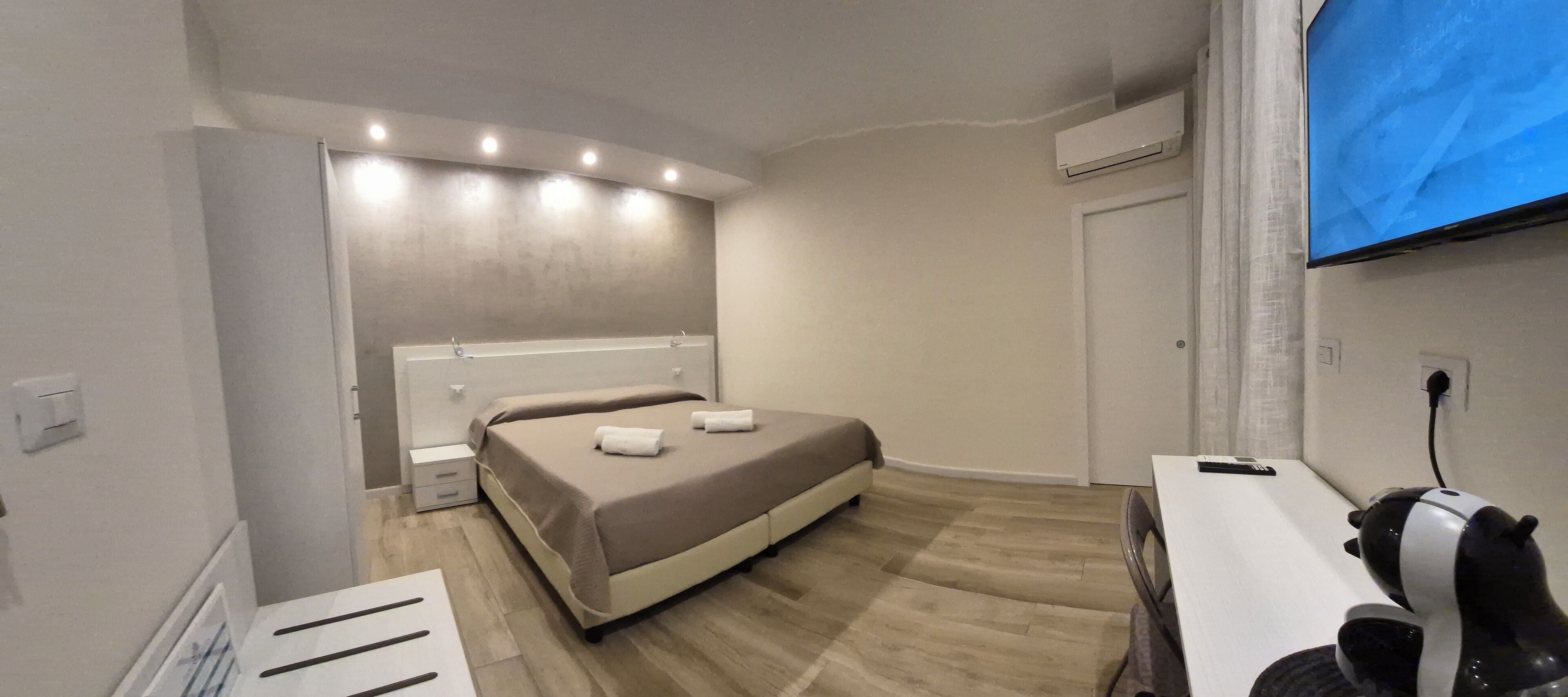 Down comforters, memory foam beds, desk, laptop workspace