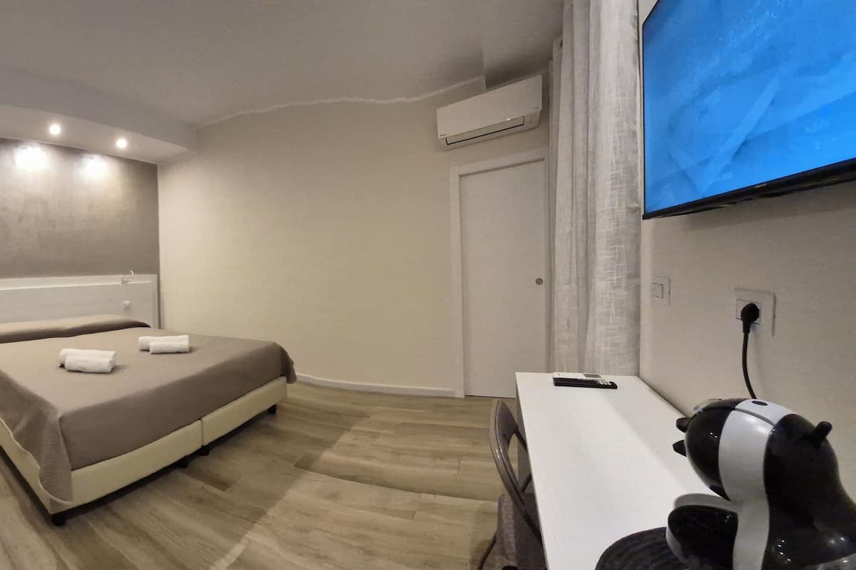 Down comforters, memory foam beds, desk, laptop workspace