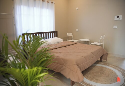 Resort-like peace 10 mins away from city, 4BHK with lush gardens & event space