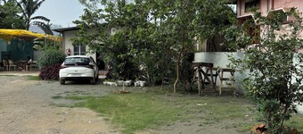 Resort-like peace 10 mins away from city, 4BHK with lush gardens & event space