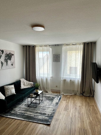 リビング エリア. Cozy, freshly renovated vacation & fitters' apartment in Egeln
