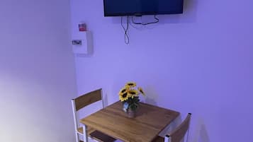 Comfort Apartment | Living area | Flat-screen TV