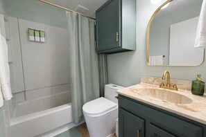Hair dryer, towels, soap, shampoo