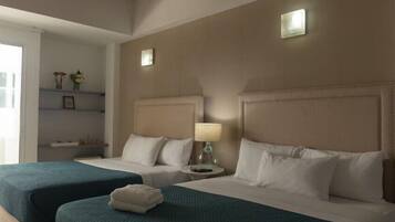 Standard Quadruple Room, Balcony | Desk, laptop workspace, free WiFi